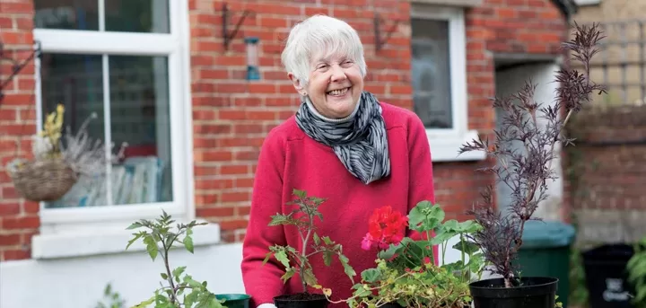 720x343 older woman gardening