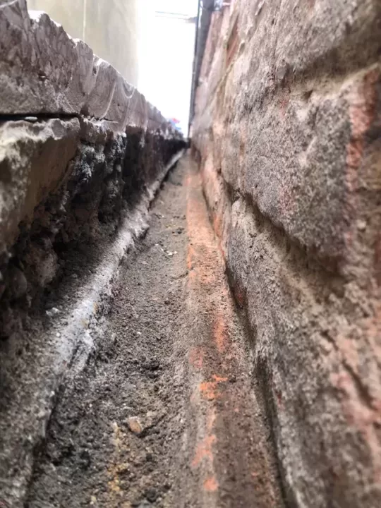 french drain paint treat the lower bricks before backfilling v0